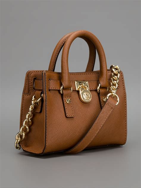 michael kors tan leather purse with gold handle